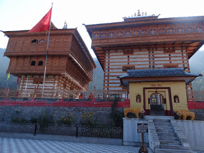 The top floor in the left building houses Maa Bhimakali
